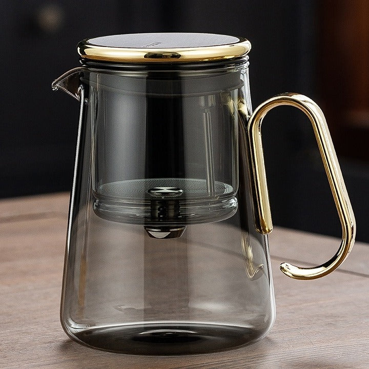 The Lumen Teapot in smoke glass with gold trim