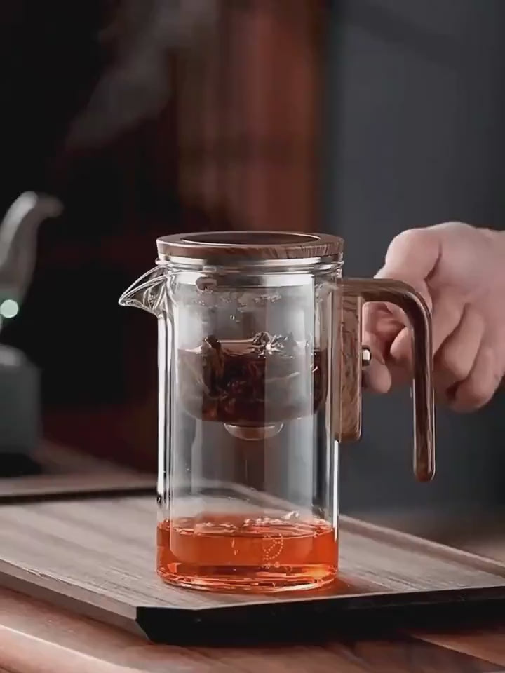 Pouring hot water, pressing the lid and serving tea from the Ember Teapot